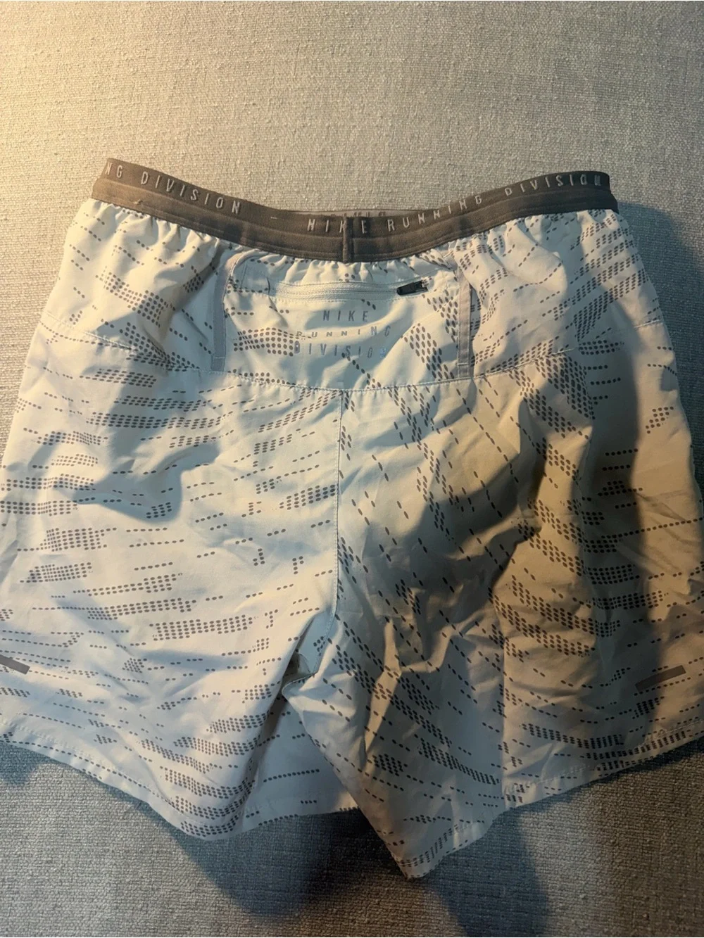 Nike Men's Light Gray Athletic Shorts with Green Drawstring